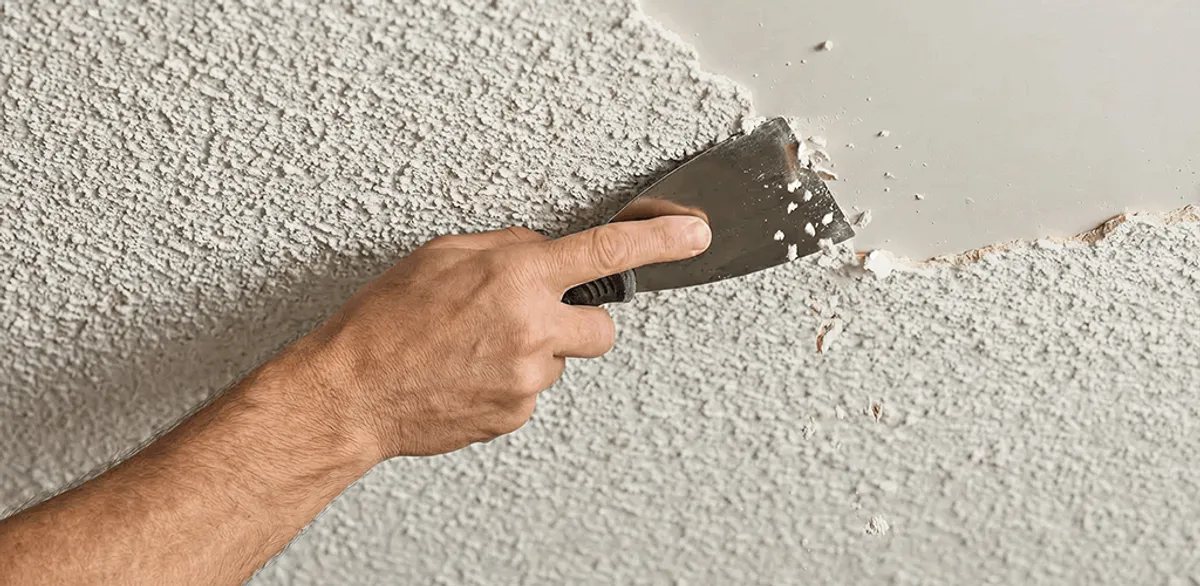 Popcorn ceiling removal scraping off textured ceiling finish in Charlotte, NC