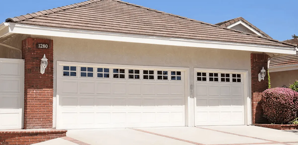 Residential garage door repair service for a double garage door in Charlotte, NC