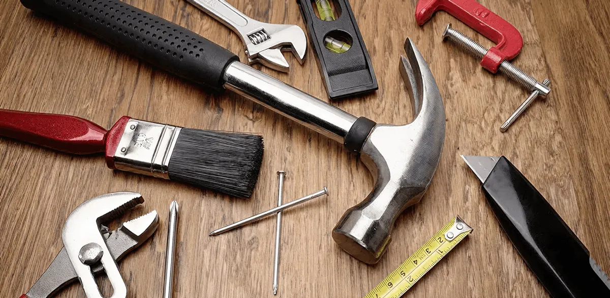 Handyman tools laid out for home repair and maintenance work in Charlotte, NC